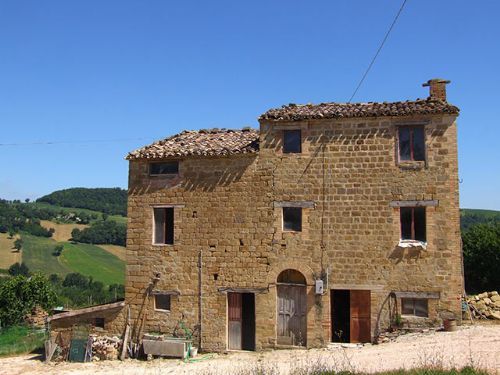 Old farmhouse with a very large barn