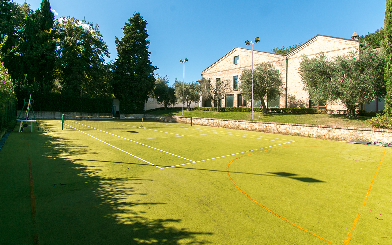 Villa delle Camelie is a luxury villa with swimming pool, tennis courts, and gym for sale - 2