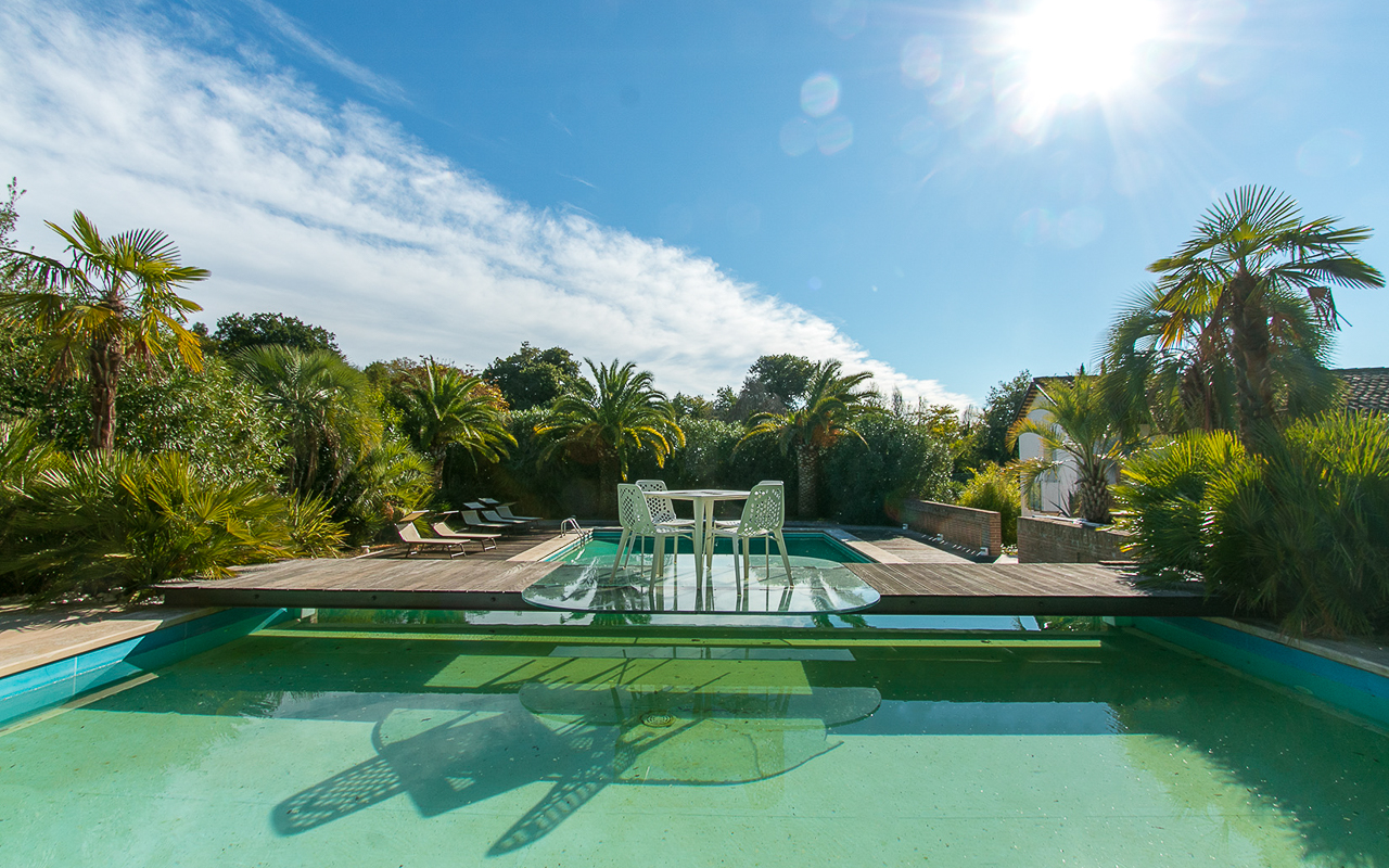 Villa delle Camelie is a luxury villa with swimming pool, tennis courts, and gym for sale - 3