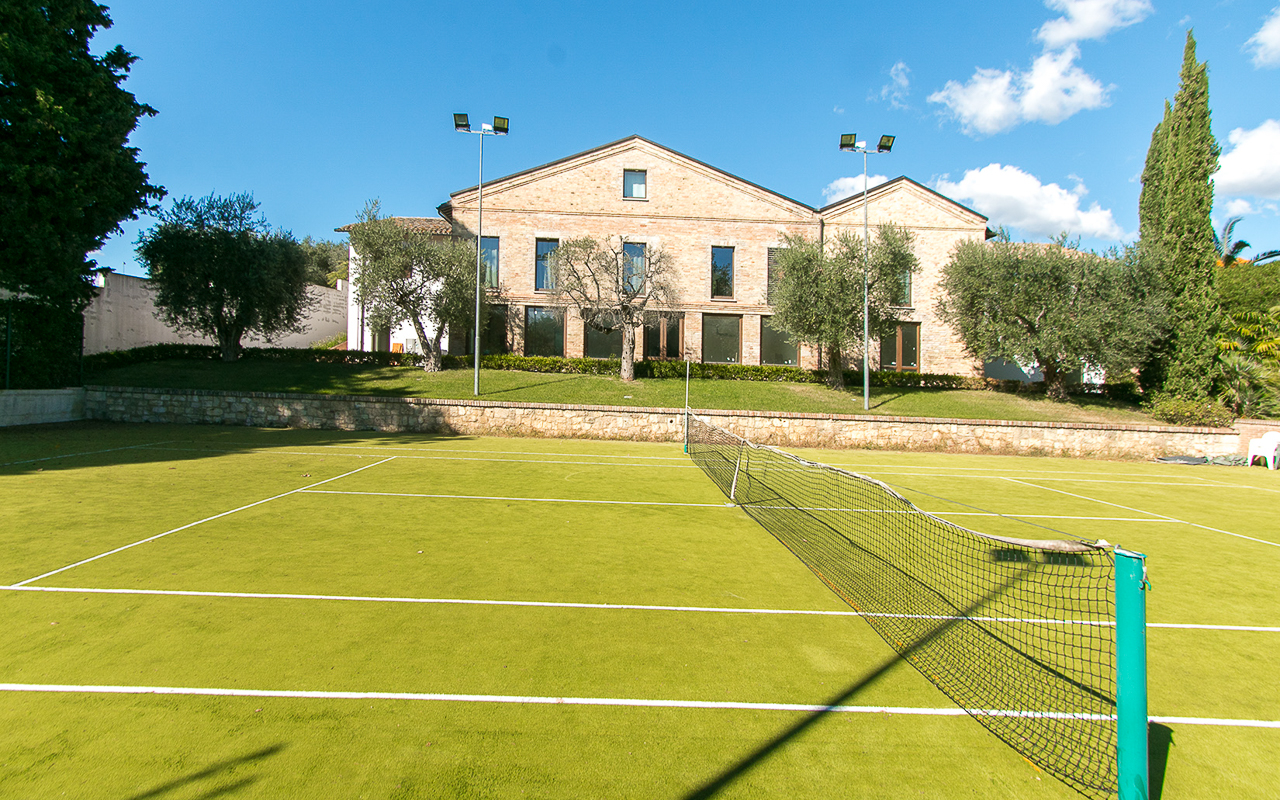 Villa delle Camelie is a luxury villa with swimming pool, tennis courts, and gym for sale - 4
