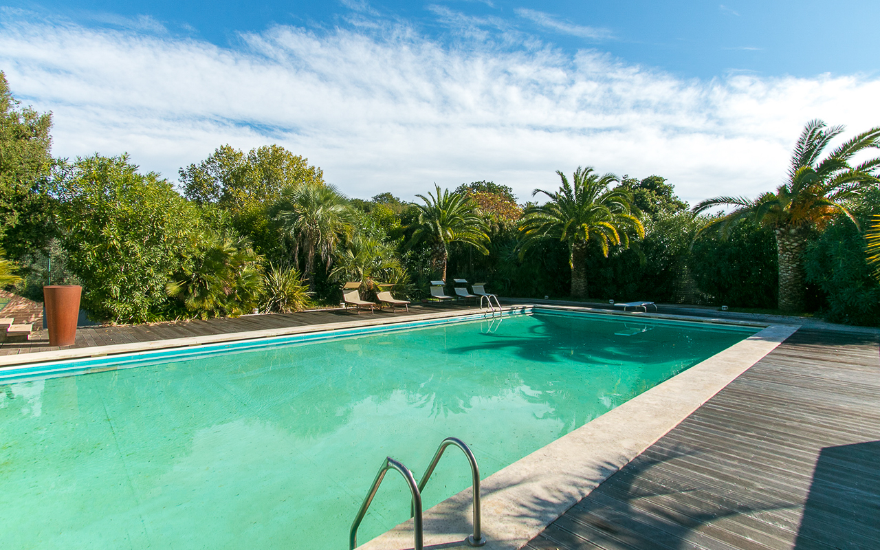 Villa delle Camelie is a luxury villa with swimming pool, tennis courts, and gym for sale - 5