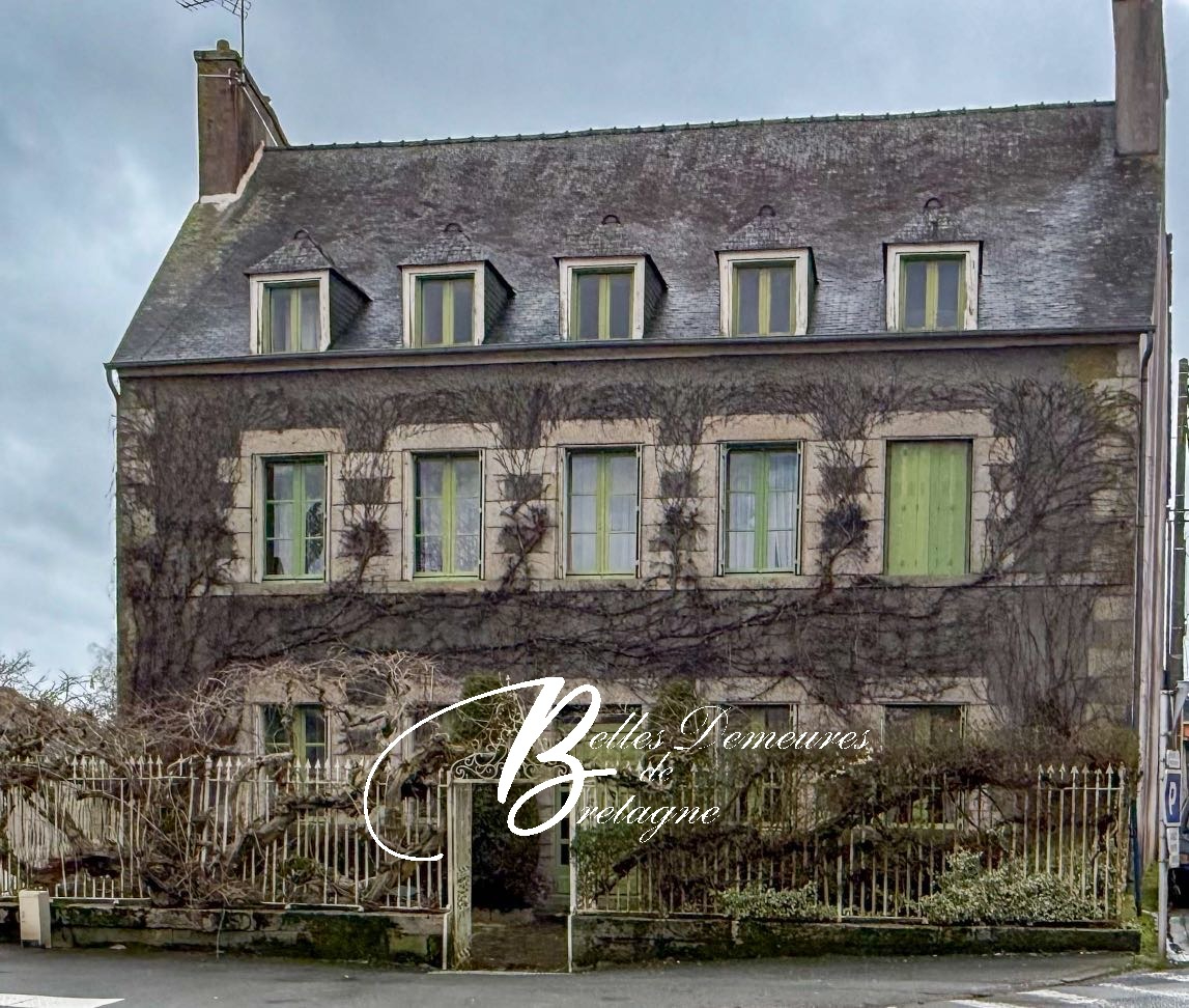 Distinguished manor house with outbuildings