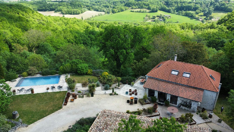 Stylish 3 bed house, 2 bed gite with pool and terraces set in 8Ha with stables and fenced paddocks