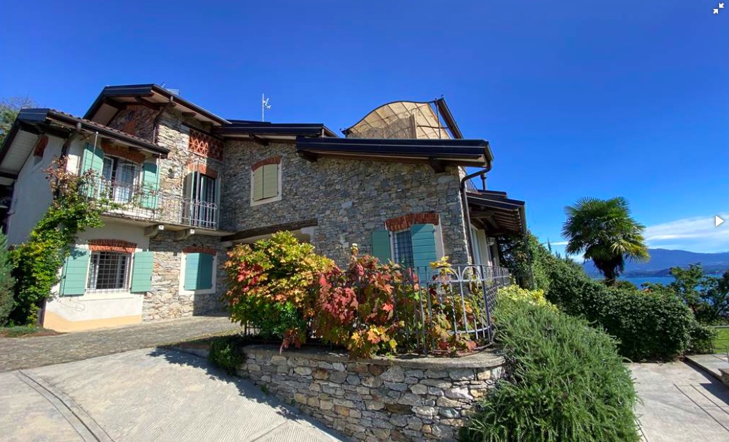 Stone villa with large garden and beautiful lake view