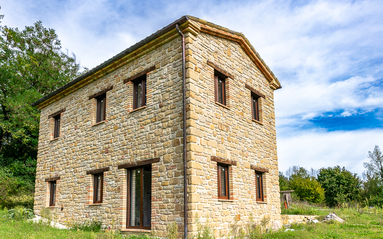 Nestled in the serene Italian countryside of Le Marche, this meticulously reconstructed farmhouse offers a harmonious blend of traditional charm and modern resilience - 2