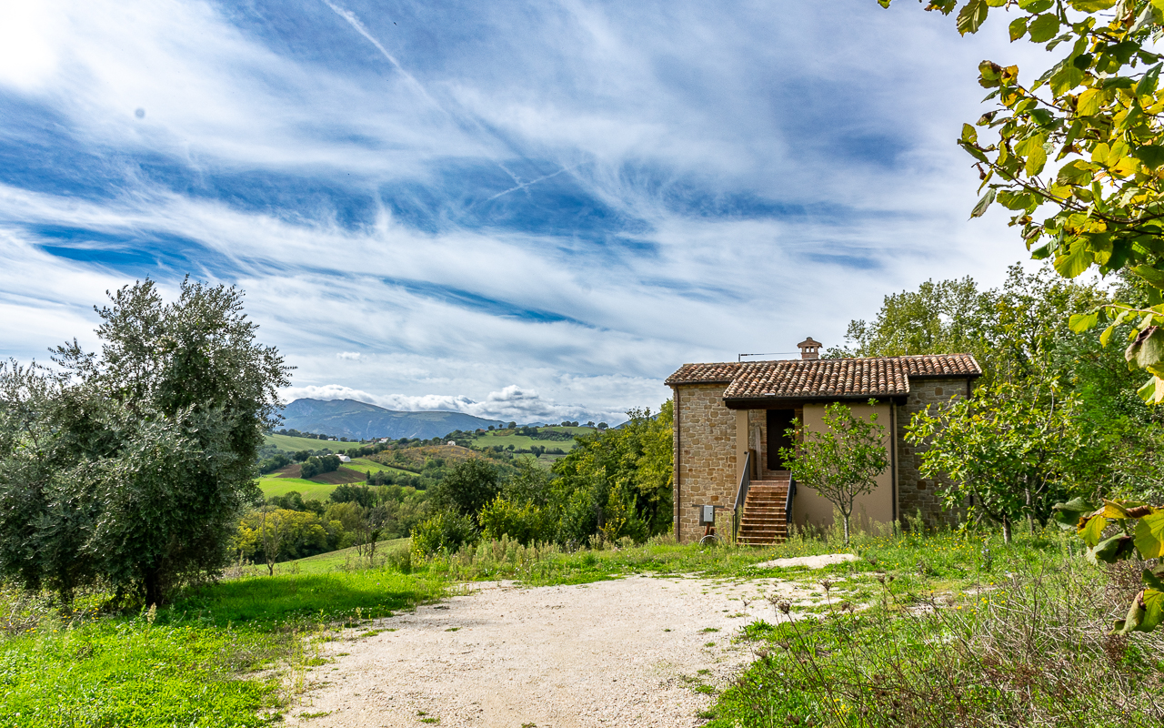 Nestled in the serene Italian countryside of Le Marche, this meticulously reconstructed farmhouse offers a harmonious blend of traditional charm and modern resilience - 4