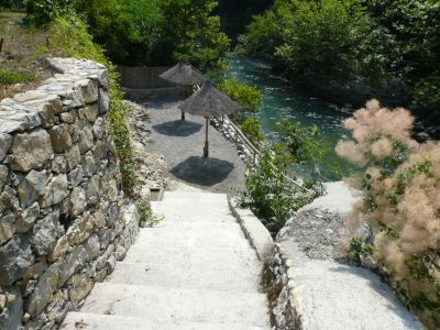 Apartment with communal swimming pool and private beach