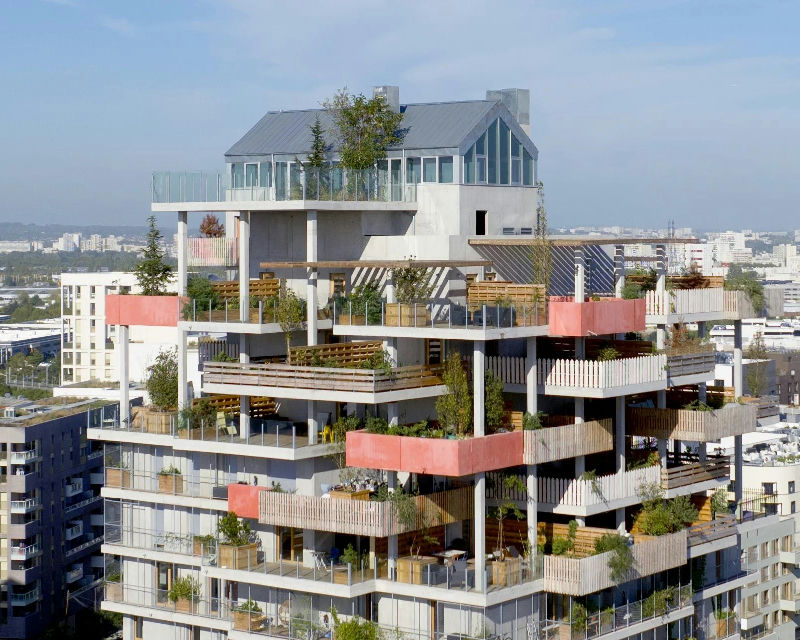 A penthouse with a rooftop terrace and a view